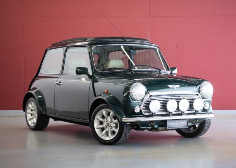 MINI MINI 1.3i Knightsbridge (1st hand Swiss car, as new, certified very low mileage, sunroof, collector item)