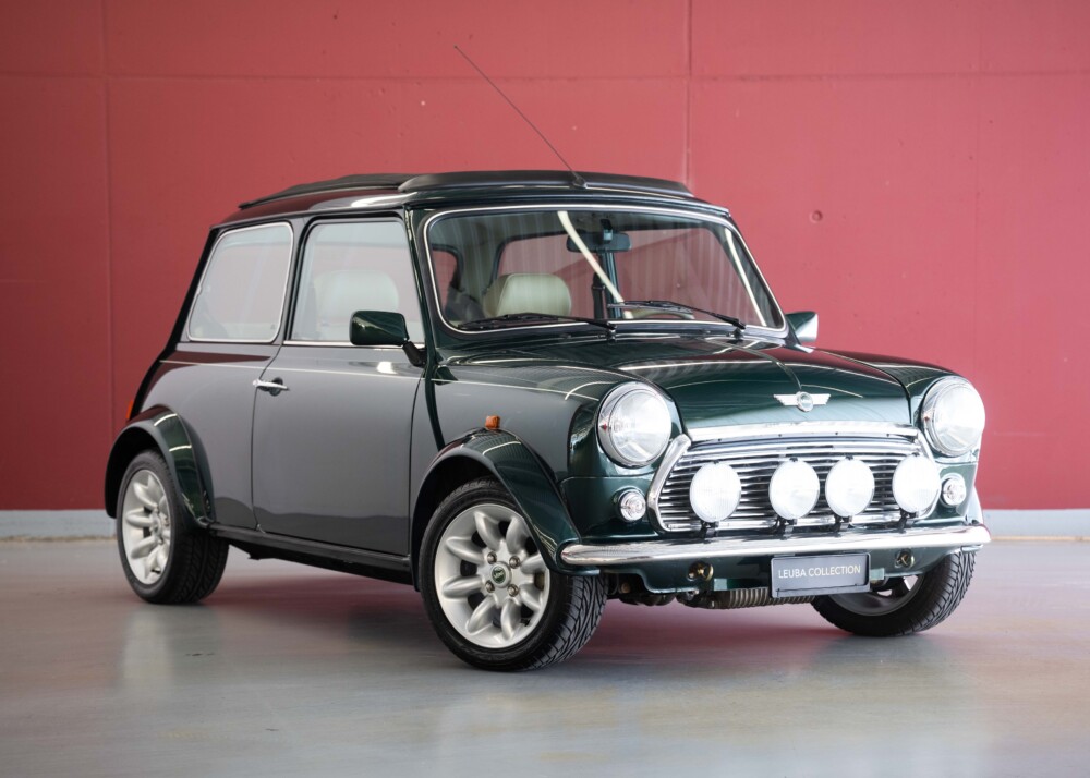 MINI MINI 1.3i Knightsbridge (1st hand Swiss car, as new, certified very low mileage, sunroof, collector item)